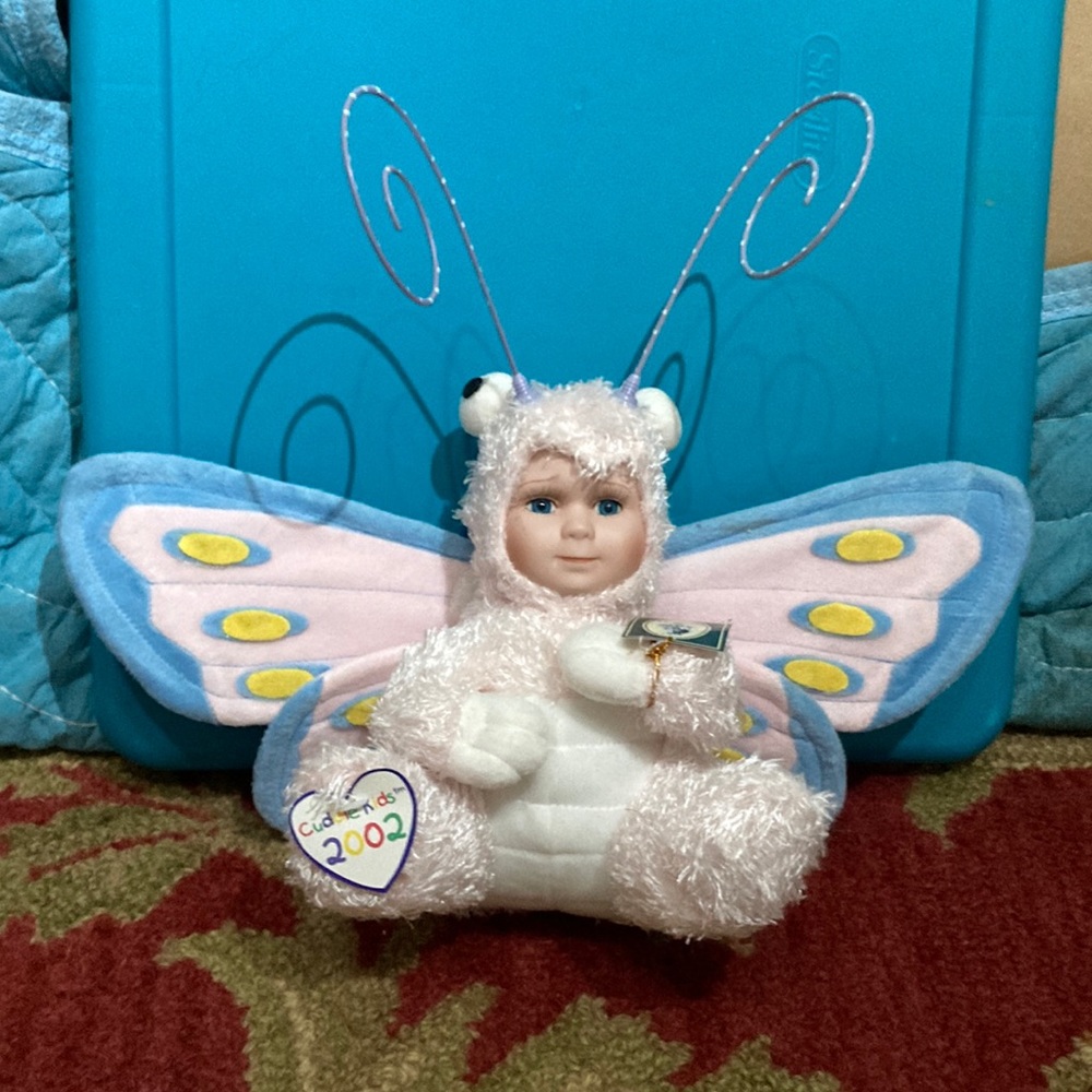 Geppeddo butterfly porcelain face doll